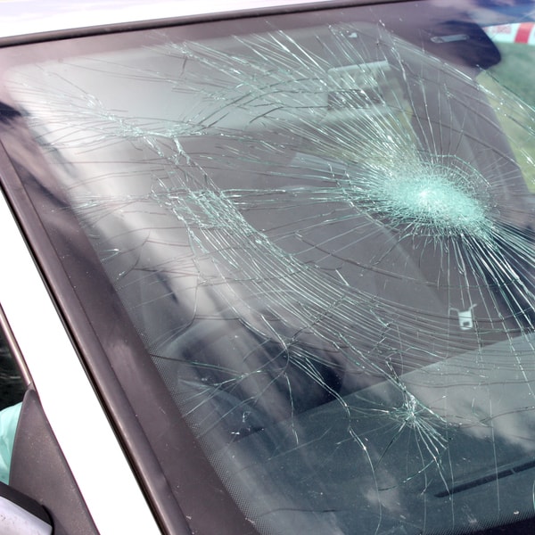 which auto glass replacement service to call and how much does it cost to fix broken windshield 